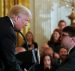 President Donald Trump, left, shakes hands with then-acting Veterans Affairs Secretary Robert Wilkie after informing him that he will be nominating him to be the new Secretary of the VA, during the Prison Reform Summit at the White House in Washington, U.S., May 18, 2018. (Photo: Reuters)