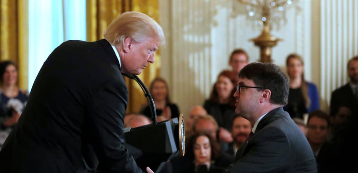 President Donald Trump, left, shakes hands with then-acting Veterans Affairs Secretary Robert Wilkie after informing him that he will be nominating him to be the new Secretary of the VA, during the Prison Reform Summit at the White House in Washington, U.S., May 18, 2018. (Photo: Reuters)