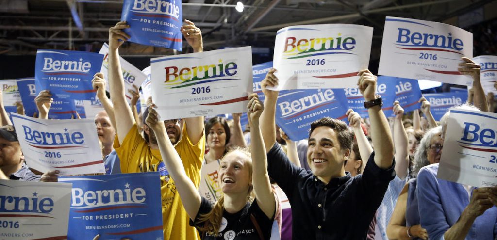 Supporters of Democratic presidential candidate Sen. Bernie Sanders, I-Vt., cheer at a campaign rally in Portland, Maine. Sanders is packing 'em in: 10,000 people in Madison, Wis.; more than 2,500 in Council Bluffs, Iowa; another 7,500 in Portland, Maine.