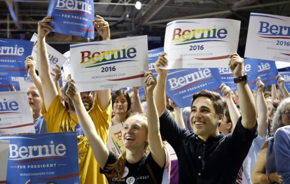 Supporters of Democratic presidential candidate Sen. Bernie Sanders, I-Vt., cheer at a campaign rally in Portland, Maine. Sanders is packing 'em in: 10,000 people in Madison, Wis.; more than 2,500 in Council Bluffs, Iowa; another 7,500 in Portland, Maine.
