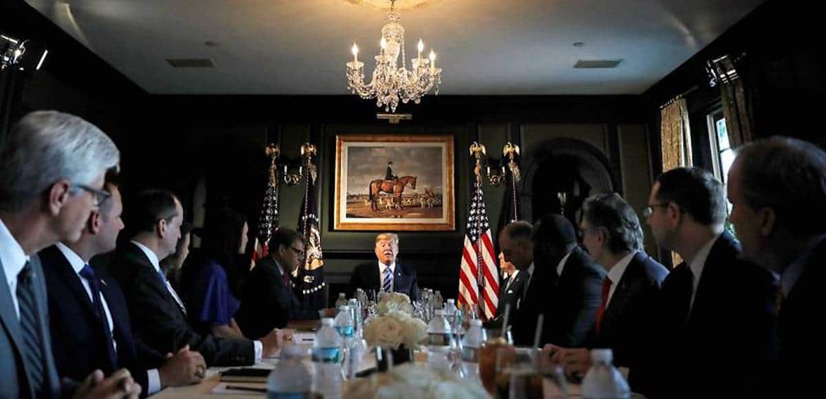 U.S. President Donald Trump participates in a roundtable discussion with state leaders (including Texas Attorney General Ken Paxton) on prison reform in Bedminster, New Jersey on August 9, 2018. (Photo: Reuters)