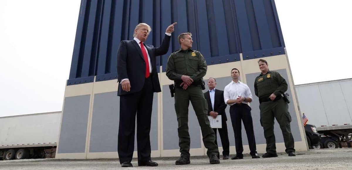 President Donald Trump talks with U.S. Customs and Border Protection (CBP) Border Patrol Agents, including Carla Provost, near the Otay Mesa Port of Entry in San Diego, California. U.S., March 13, 2018. (Photo: Reuters)