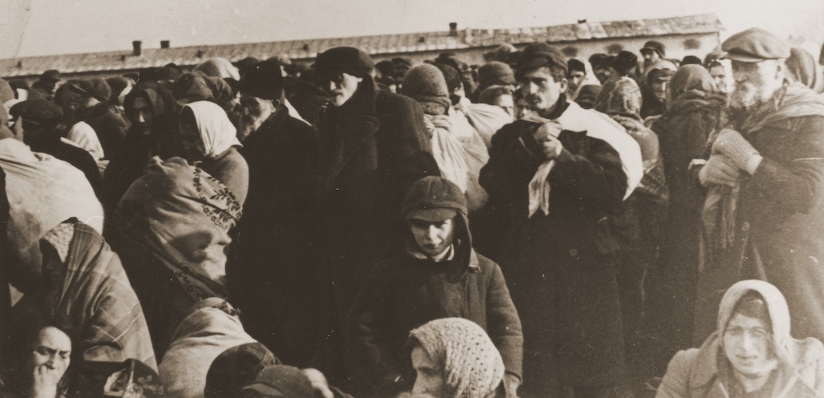 Jews at Trawniki Labor Camp, likely as they arrived from Warsaw in April, 1943. (Photo: Courtesy of the Justice Department)