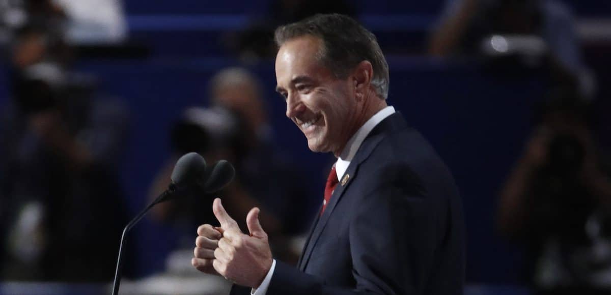 U.S. Representative Chris Collins (R-NY) flashes a thumbs-up before delivering his nomination speech at the Republican National Convention in Cleveland, Ohio, U.S. July 19, 2016.