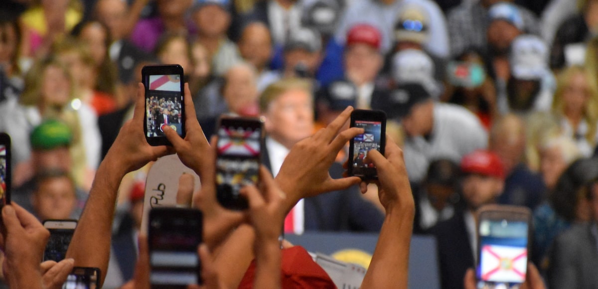 Supporters take photo and video of President Donald Trump during a rally in Tampa, Florida on Tuesday, July 31, 2018. (Photo: Laura Baris/People's Pundit Daily)