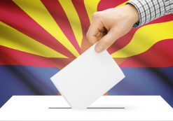 Voting, elections and state polls concept: Ballot box with state flag in the background - Arizona. (Photo: AdobeStock)
