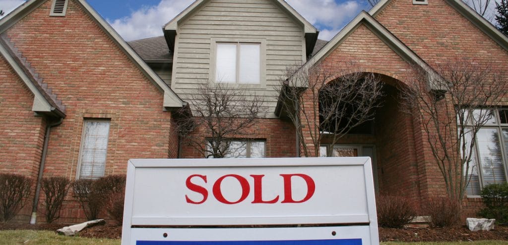 File photo: A sold sign on an existing home. (Photo: AdobeStock)