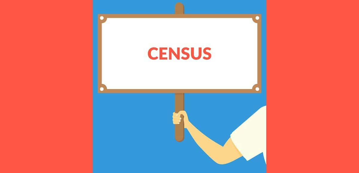 A vector of a man holding up a sign with the words CENSUS. (Photo: AdobeStock)