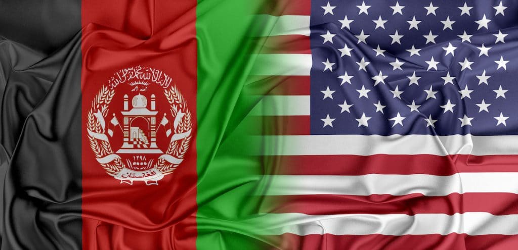 U.S.-Afghan relations depicted in a graphic concept of blended flags of the U.S. and Afghanistan. (Photo: AdobeStock)