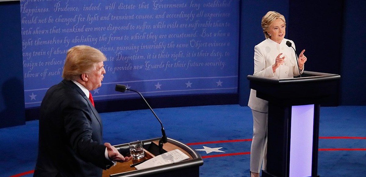 Donald Trump, left, and Hillary Clinton, right, on the debate stage in Las Vegas, Nevada on October 19, 2016. (Photo: Mark Ralston/Pool/Reuters)