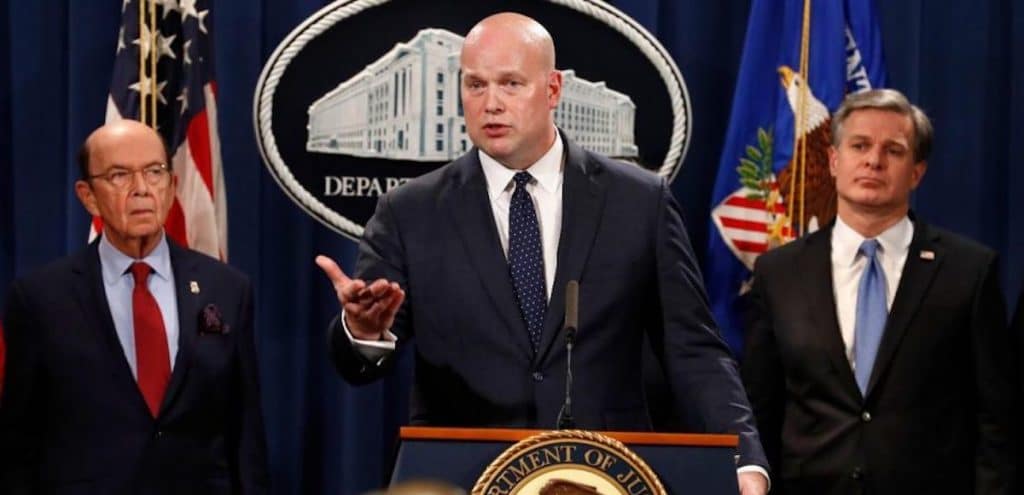 Acting Attorney General Matthew Whitaker, center, FBI Director Christopher Wray, right, and Commerce Secretary Wilbur Ross, left, announce indictments against Chinese telecommunications conglomerate Huawei. (Photo: Screenshot)
