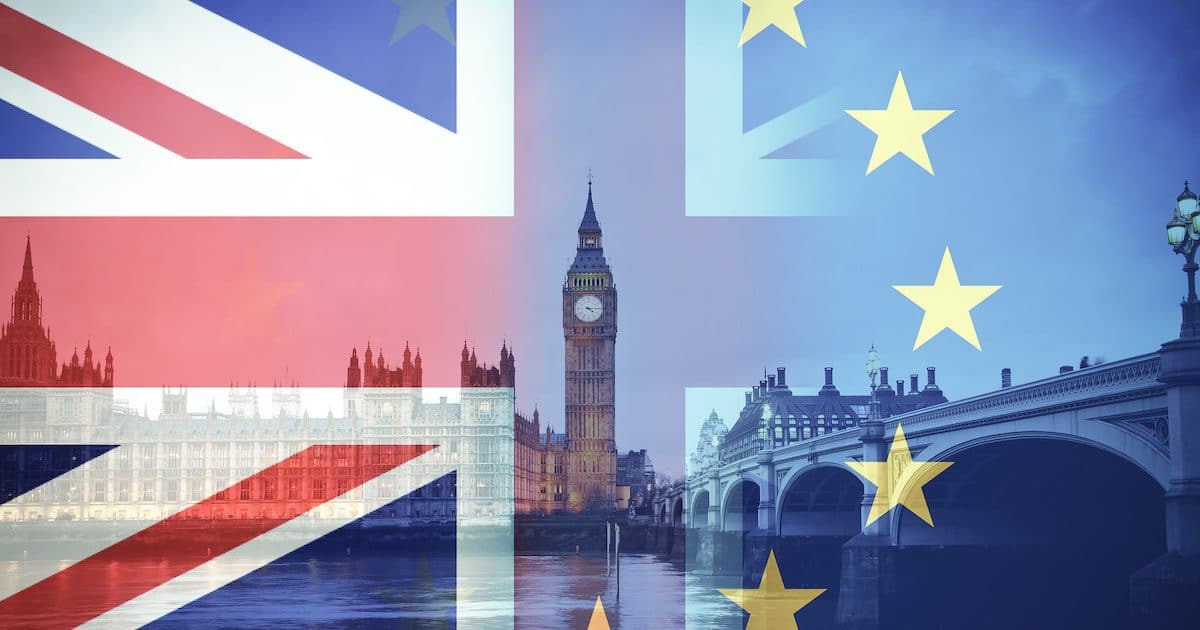 Flags of United Kingdom (UK) and European Union (EU) combined over British icons of London, for a Brexit concept. (Photo: AdobeStock)