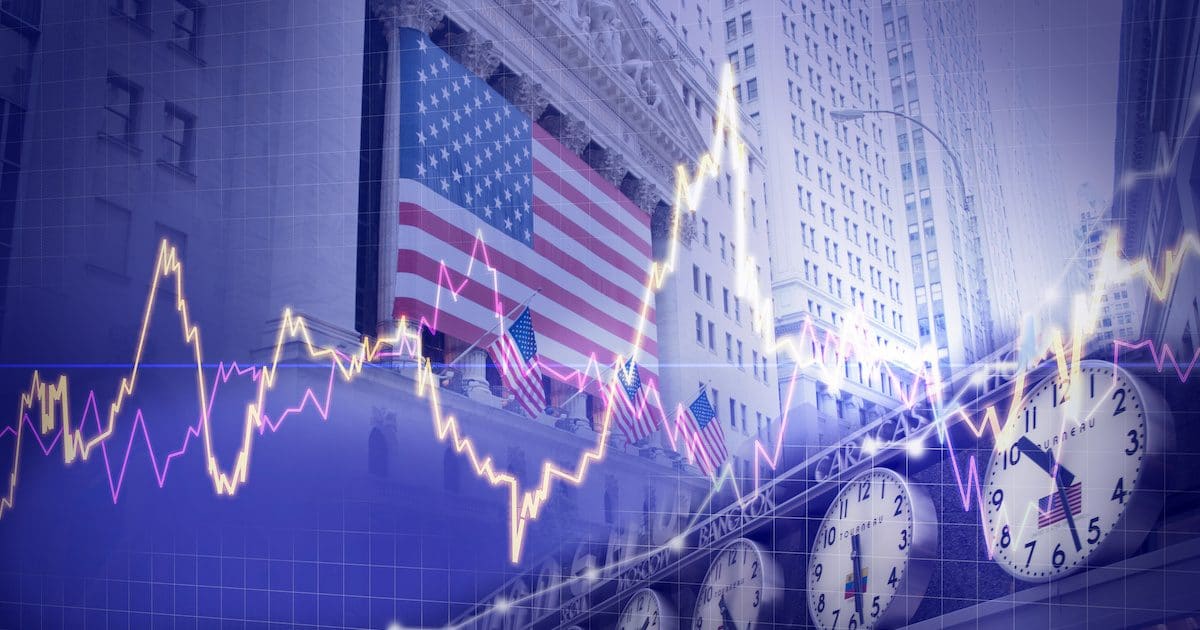 Markets concept depicting the American flag draped over the New York Stock Exchange (NYSE) at Wall Street. (Photo: AdobeStock)