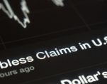 U.S. initial jobless claims graph on a tablet screen. (Photo: AdobeStock)