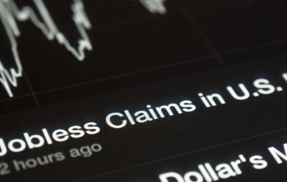 U.S. initial jobless claims graph on a tablet screen. (Photo: AdobeStock)