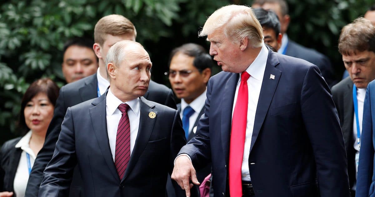 U.S. President Donald Trump and Russia's President Vladimir Putin talk during the family photo session at the APEC Summit in Danang, Vietnam November 11, 2017. (Photo: Reuters)