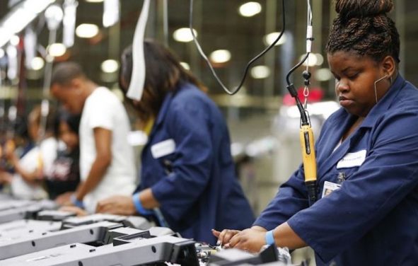 A factory worker at a New York manufacturing plant. (Photo: Reuters)