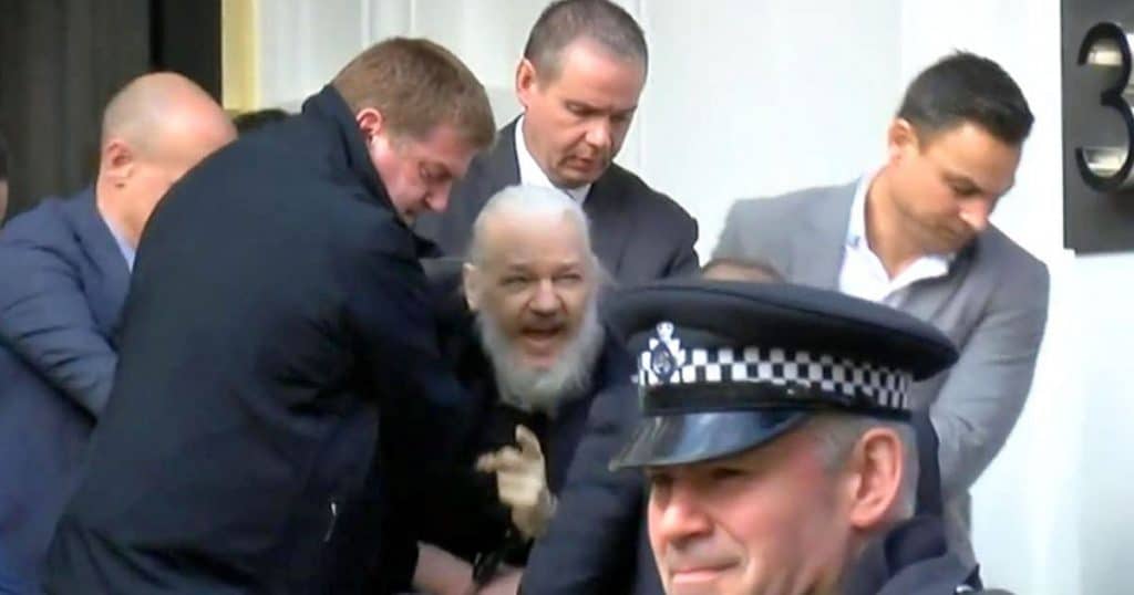 WikiLeaks founder Julian Assange physically removed from the Ecuadorian Embassy. (Photo: Screenshot)
