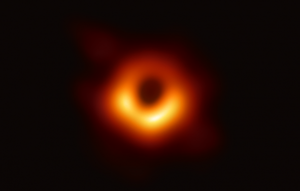 Using the Event Horizon Telescope, scientists obtained an image of the black hole at the center of galaxy M87, outlined by emission from hot gas swirling around it under the influence of strong gravity near its event horizon. (Photo: Event Horizon Telescope collaboration et al.)