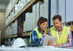Wholesale inventories concept depicting by employees having short meeting in the warehouse to check levels of business inventories. First in first out. (Photo: AdobeStock)