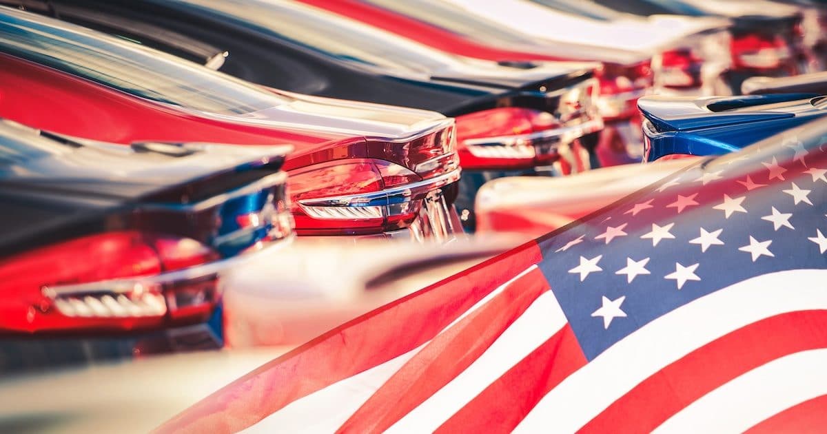 Buying American Made Cars. Supporting the American auto industry and economy photomontage with automobiles and the American Flag. (Photo: AdobeStock)