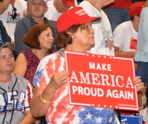 A support of President Donald Trump holds up a 
