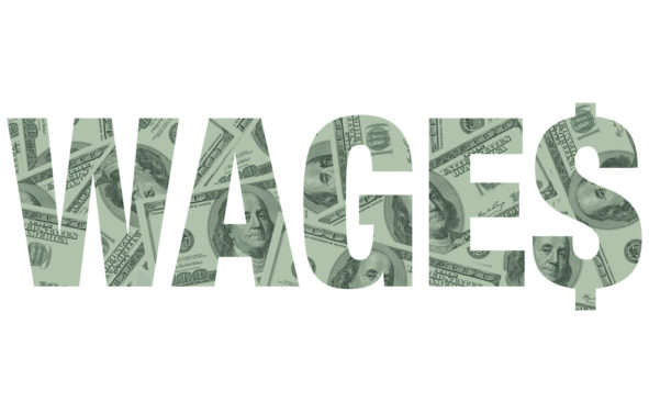 Wages, or average hourly earnings (AHE), graphic concept depicted in hundred dollar bills. (Photo: AdobeStock)