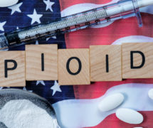 Scrabble-like text depicting opioids on an American flag to underscore the opioid epidemic in the United States. (Photo: AdobeStock)
