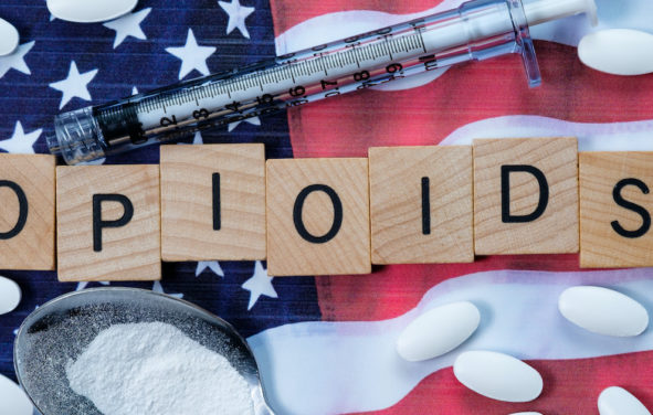 Scrabble-like text depicting opioids on an American flag to underscore the opioid epidemic in the United States. (Photo: AdobeStock)