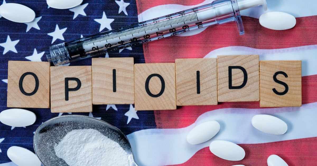 Scrabble-like text depicting opioids on an American flag to underscore the opioid epidemic in the United States. (Photo: AdobeStock)