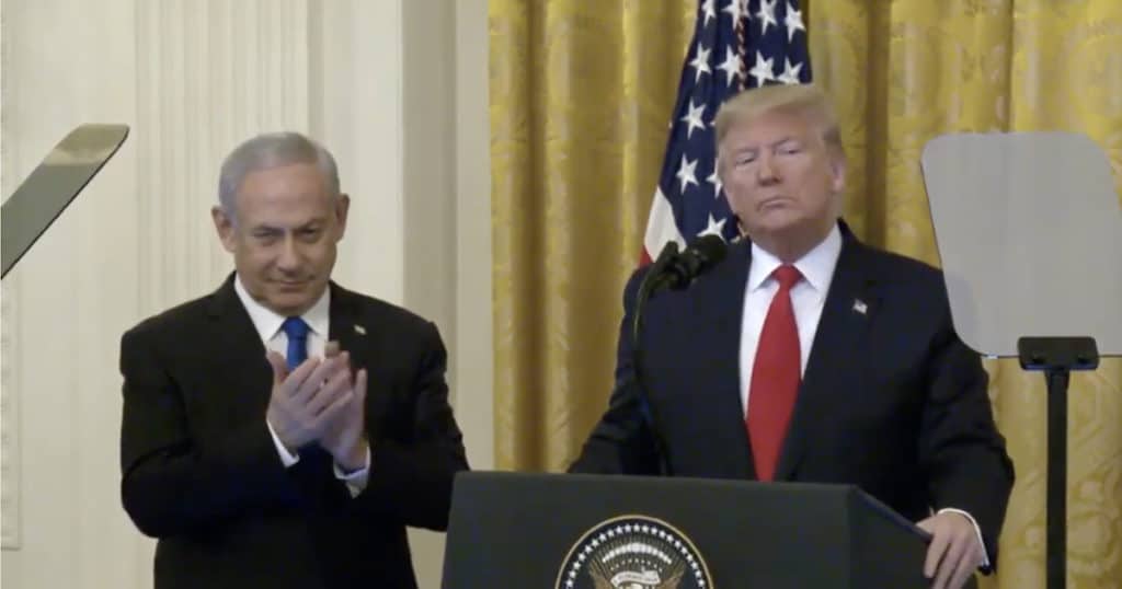 U.S. President Donald J. Trump, flanked by Israeli Prime Minister Benjamin Netanyahu, unveils his Middle East Peace Plan at the White House on Tuesday, January 28, 2020.