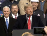 President Donald Trump—flanked by Vice President Mike Pence, business leaders and lawmakers—celebrating the signing the United States-Mexico-Canada Trade Agreement (USMCA) at the White House on Wednesday, January 29, 2020.