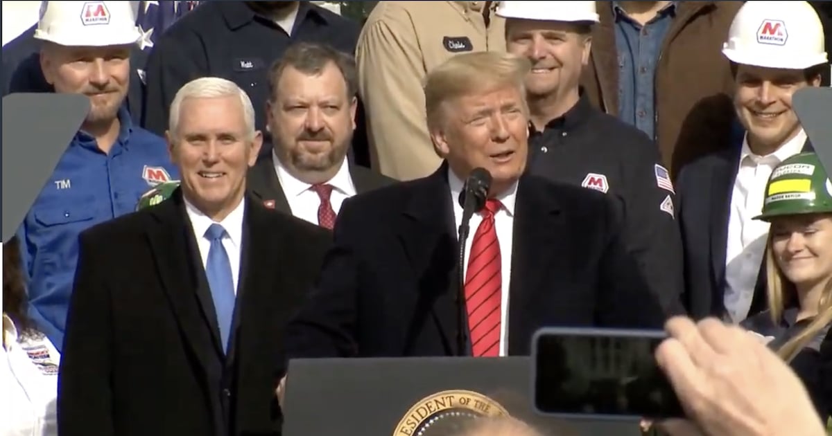 President Donald Trump—flanked by Vice President Mike Pence, business leaders and lawmakers—celebrating the signing the United States-Mexico-Canada Trade Agreement (USMCA) at the White House on Wednesday, January 29, 2020.