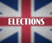 UK Elections on blurred Union Jack flag. The graphic illustration and concept for British elections. (Photo: AdobeStock)