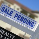 A photo of a home pending for sale with sale pending on a realty sign. (Photo: AdobeStock)