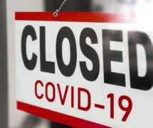 Closed small businesses for coronavirus (COVID-19) pandemic, closure sign on retail store window banner background. (Photo: AdobeStock)