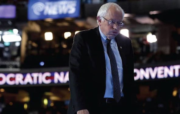 Bernie Sanders stands at the podium on stage during a walk through before the start of the Democratic National Convention (DNC) in Philadelphia, Pennsylvania on July 25, 2016. (Photo: SS)