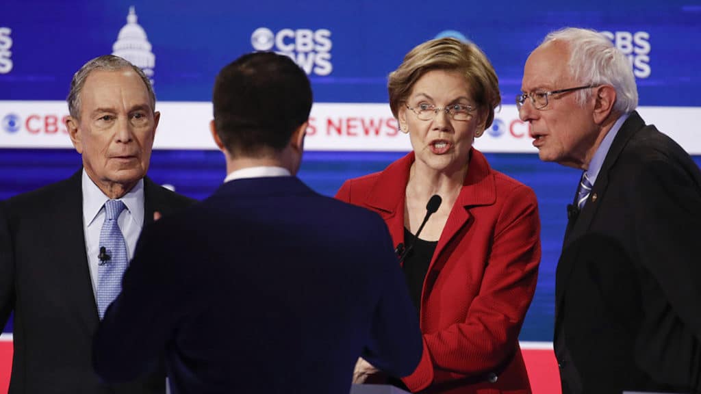 From left, Democratic presidential candidates, former New York City Mayor Mike Bloomberg, former South Bend Mayor Pete Buttigieg, Sen. Elizabeth Warren, D-Mass., and Sen. Bernie Sanders, I-Vt., talk to one another after participating in a Democratic presidential primary debate at the Gaillard Center, Tuesday, Feb. 25, 2020, in Charleston, S.C., co-hosted by CBS News and the Congressional Black Caucus Institute. (AP Photo/Patrick Semansky)