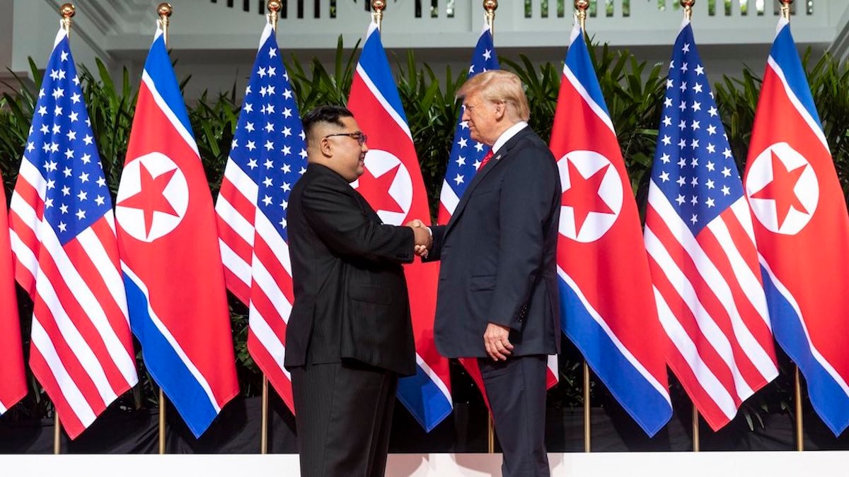 U.S. President Donald J. Trump shaking hands with North Korean Chairman Kim Jong Un during the US-DPRK nuclear summit in Singapore on June 12, 2018. (Photo: White House)