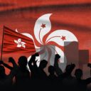 Hong Kong Flag in the background with protesting crowd to illustrate demonstrations and political relations in Hong Kong. (Photo: AdobeStock)