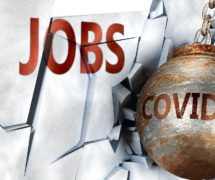 Coronavirus (COVID-19) and jobs, symbolized by the coronavirus virus destroying word jobs to picture that the virus affects employment and jobs. (Photo: AdobeStock)