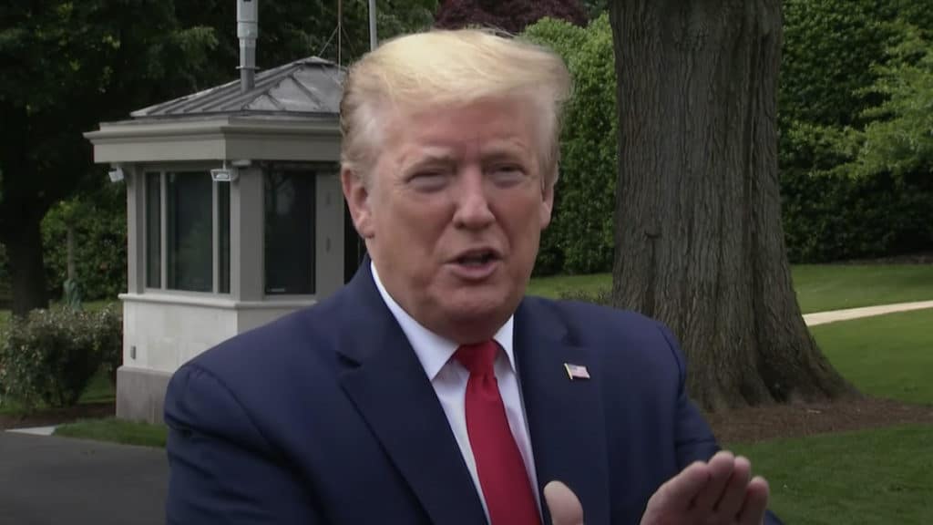 President Donald Trump speaks to reporters outside the White House on his way to Ypsilanti, Michigan. (Photo: People's Pundit Daily/PPD)