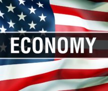 U.S. economy on an American flag background waving in the wind, in 3D rendering. (Photo: AdobeStock)