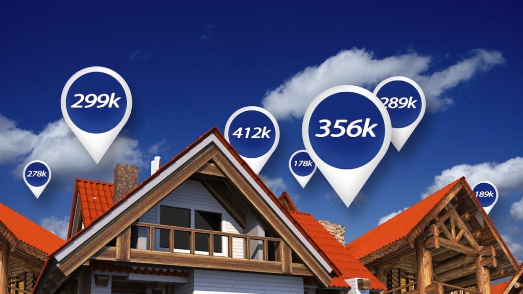 Real estate market with price tags above home properties to illustrate house prices in 3D abstract. (Photo: AdobeStock)