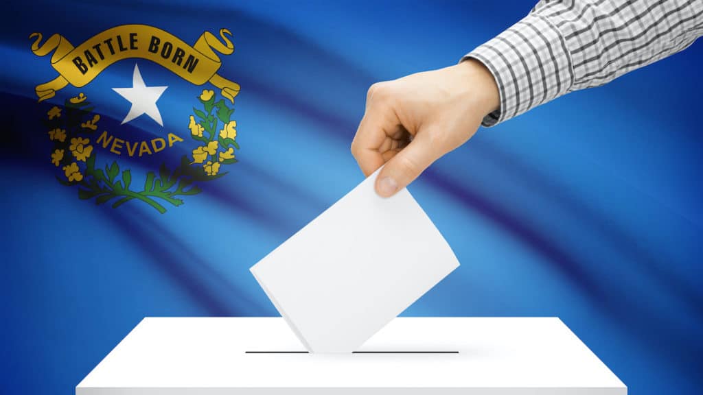 Voting, elections and state polls concept: Ballot box with state flag in the background - Nevada. (Photo: AdobeStock)