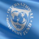 Flag of International Monetary Fund or IMF, an international organization that aims to promote international trade and monetary cooperation and the stabilization of exchange rates. 3D illustration. (Photo AdobeStock)
