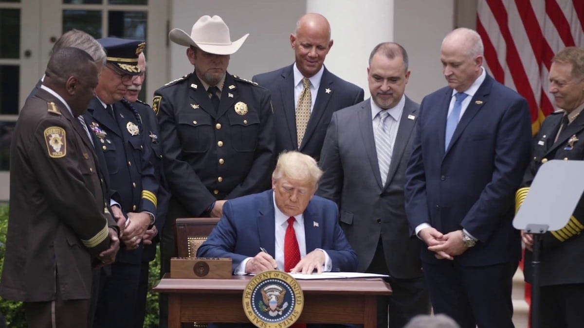 President Donald Trump signs an Executive Order on Safe Policing for Safe Communities after delivering remarks at the White House on Tuesday, June 16, 2020. (Photo: SS/PPD)