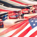 Buying American Made Cars. Supporting the American auto industry and economy photomontage with automobiles and the American Flag. (Photo: AdobeStock)
