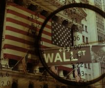 Graphic concept taking a magnifying glass to Wall Street. (Photo: AdobeStock)