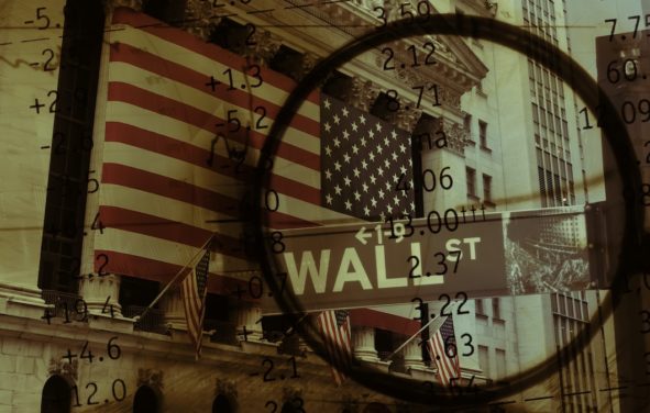 Graphic concept taking a magnifying glass to Wall Street. (Photo: AdobeStock)